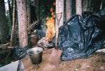 12 - Burning waste out of outhouse - rebuilt it later.   Notice upper right corner oo   Optical .jpg