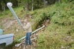 18 - My neighbor Randy setting up his water collection.  His and his 2 brothers cabin is one mil.jpg